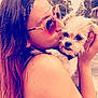 person, dog, sunglasses, kiss, outdoor, pet, affection, closeup, hair, headband, face, hand, fur, small_dog, animal, nature, shoulder, skin, love, casual