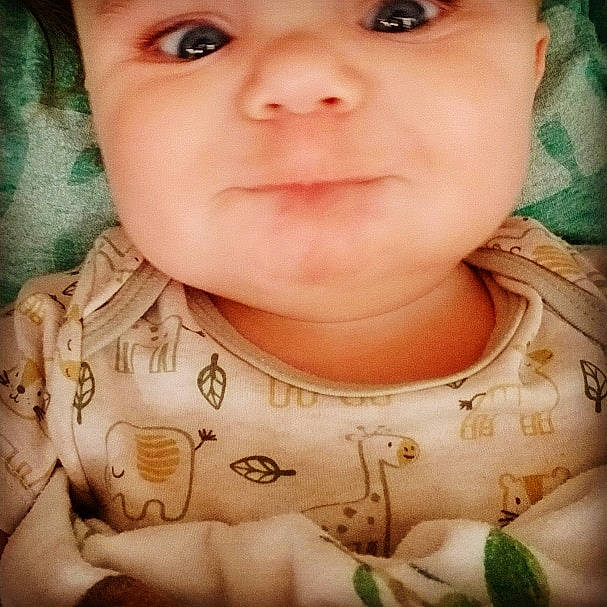 Devlin is registered to the contest to win money with this photo: baby, baby_toddler_clothing, cheek, child, child_model, chin, eyebrow, eyelash, forehead, headwear, iris, jaw, lip, mouth, nose, organ, person, photography, portrait_photography, skin