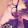 Connie Erika Kou joined the competition — help win amazing prizes! cat, tattoo, glasses_filter, heart_pattern, sticker, arm, pet, animal, indoor, closeup, cute, playful, digital_effect, resting, feline, funny, decorative, pink, relaxed, illustration