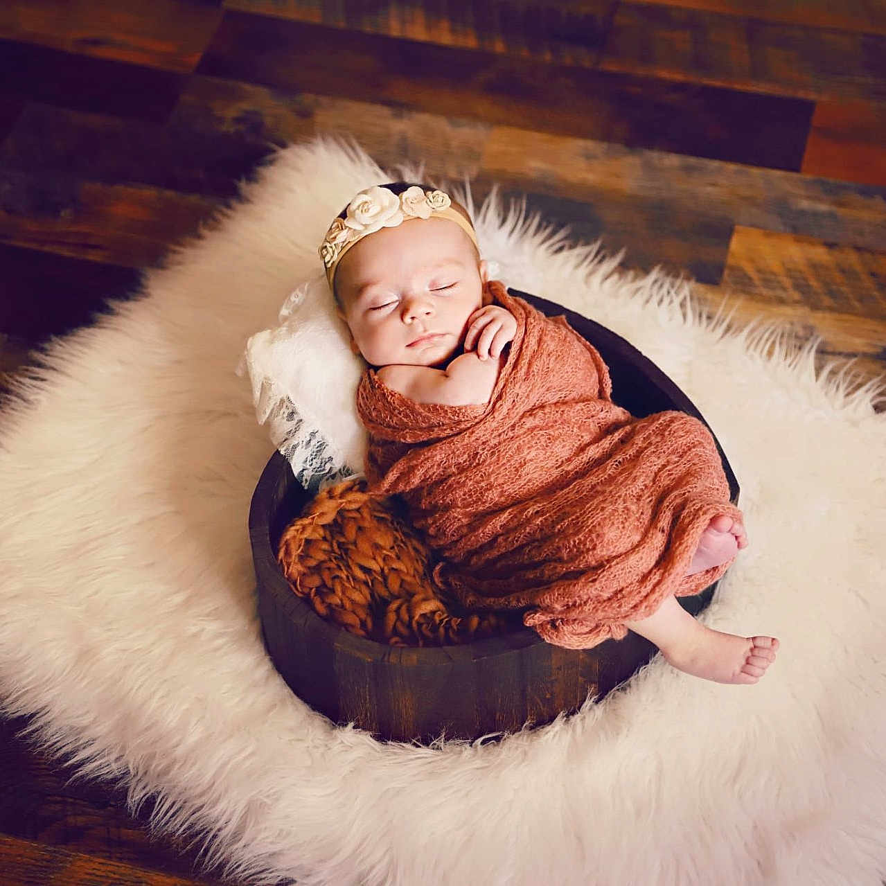 Janessa is registered to the contest to win money with this photo: baby, blanket, child, cozy, cute, headband, indoors, infant, newborn, peaceful, pillow, portrait, resting, rug, sleeping, soft, warm, wooden_bowl, wooden_floor, wrapped