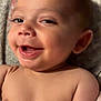 Anthony joined the competition — help win amazing prizes! baby, blanket, cheeks, child, cute, ear, expression, eyes, face, happy, human, infant, lying_down, mouth, portrait, shoulder, skin, smile, torso, young