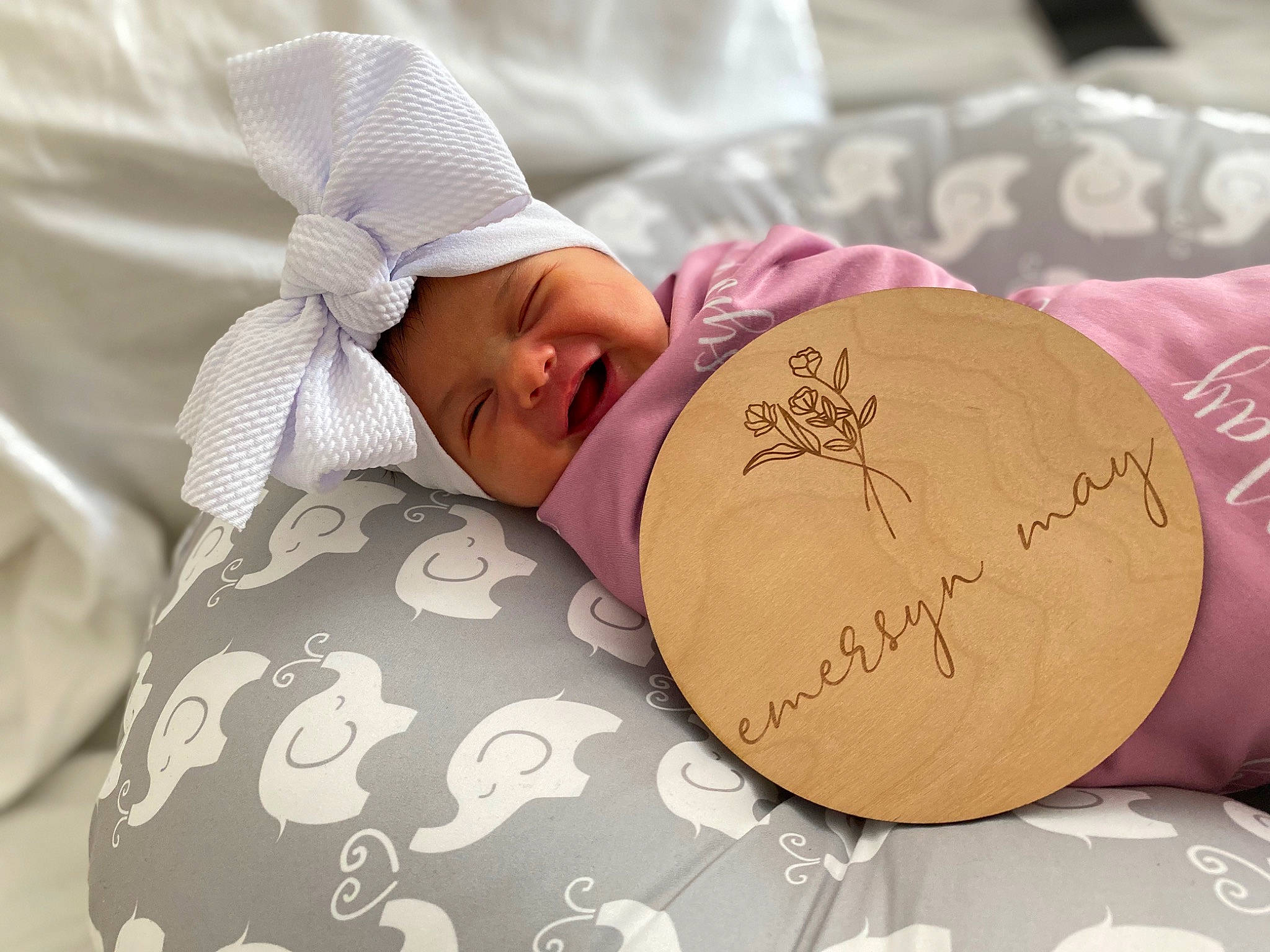 Emersyn is registered to the contest to win money with this photo: baby, baby_sleeping, beige, cap, child, comfort, fashion_accessory, headgear, headwear, linens, person, pink, product, room, sleep, textile, toddler