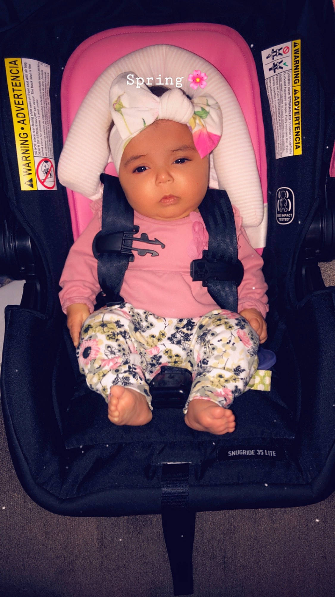 Aniyah joined the competition — help win amazing prizes! baby, baby_carriage, baby_products, baby_toddler_clothing, car_seat, cheek, child, furniture, headwear, person, pink, play, product, sitting, skin, toddler