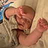 baby, sleeping, infant, bed, blanket, pillow, pacifier, portrait, indoors, cozy, nap, relaxed, feet, hands, closed_eyes, peaceful, bedding, nursery, home, resting