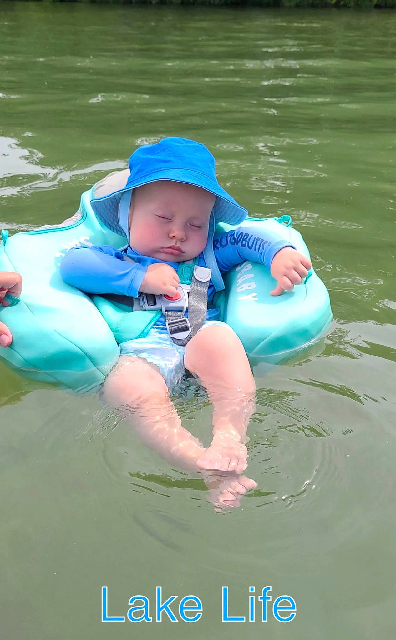 Ty joined the competition — help win amazing prizes! aqua, azure, baby, baby_products, baby_toddler_clothing, child, comfort, electric_blue, fun, gesture, grass, happy, headwear, lake, leisure, people_in_nature, person, personal_protective_equipment, recreation, toddler