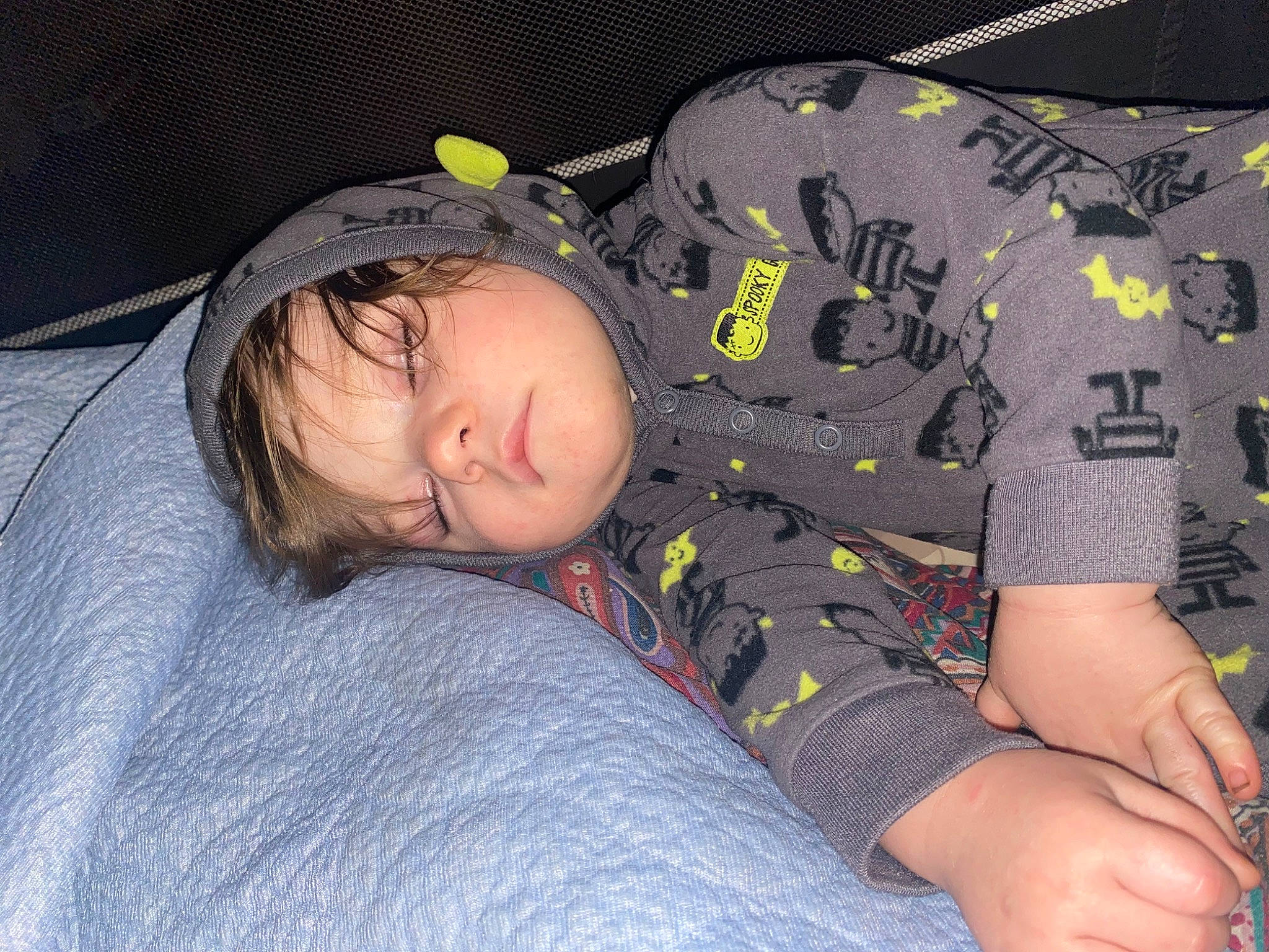 Elijah is registered to the contest to win money with this photo: baby, baby_toddler_clothing, bedtime, child, comfort, flash_photography, fun, grass, linens, military_camouflage, nap, pattern, person, personal_protective_equipment, sitting, sleep, sleeve, thigh, toddler