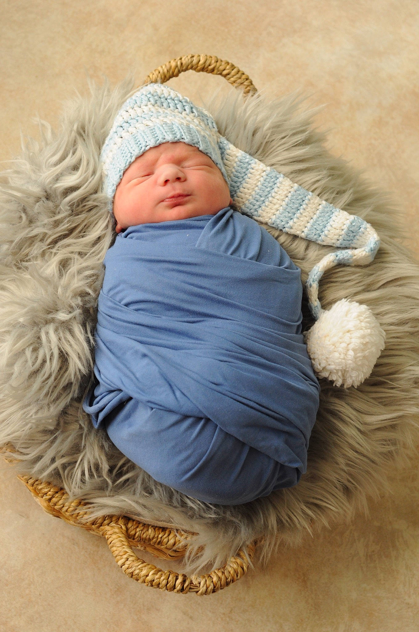Jayce is registered to the contest to win money with this photo: baby, baby_sleeping, baby_toddler_clothing, cap, child, comfort, flooring, happy, head, headgear, headwear, human_body, knit_cap, leg, linens, mammal, person, textile, toddler, vertebrate