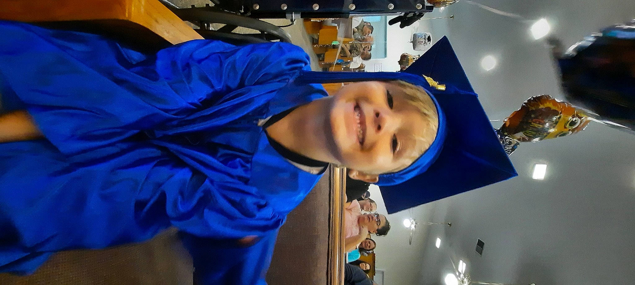 Ezekiel is registered to the contest to win money with this photo: azure, electric_blue, event, fun, joy, leisure, person, room, smile, space, t_shirt