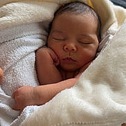 Iline a rejoint le concours — aidez-le/la à gagner de superbes lots ! arms, baby, blanket, child, closeup, comfort, cute, indoor, infant, newborn, peaceful, person, portrait, resting, skin, sleeping, soft, tender, warmth, wrapped