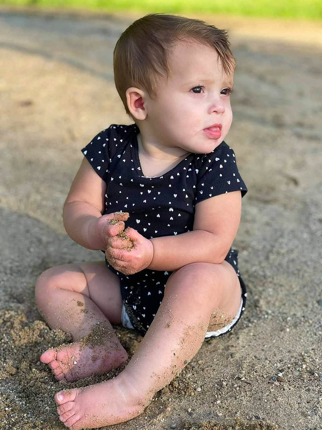 Scotlyn is registered to the contest to win money with this photo: arm, baby_toddler_clothing, cheek, eye, face, flash_photography, fun, grass, hair, happy, head, human_body, leg, people_in_nature, person, skin, sleeve, standing, thigh, toddler