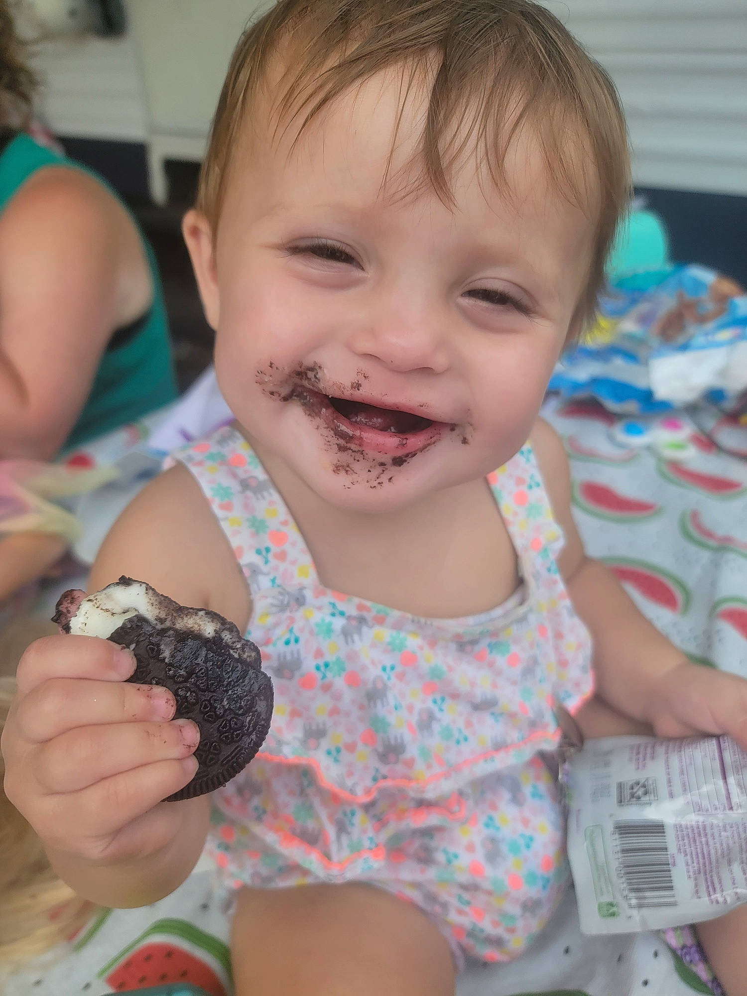 Scotlyn is registered to the contest to win money with this photo: baby, baby_toddler_clothing, cheek, child, face, finger, food, fun, hand, happy, head, iris, joy, mouth, nail, organ, person, skin, smile, summer