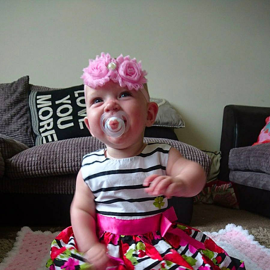 Abigail is registered to the contest to win money with this photo: birthday, birthday_cake, cake, cake_decorating, child, day, fun, headwear, joy, person, pink, product, smile, toddler