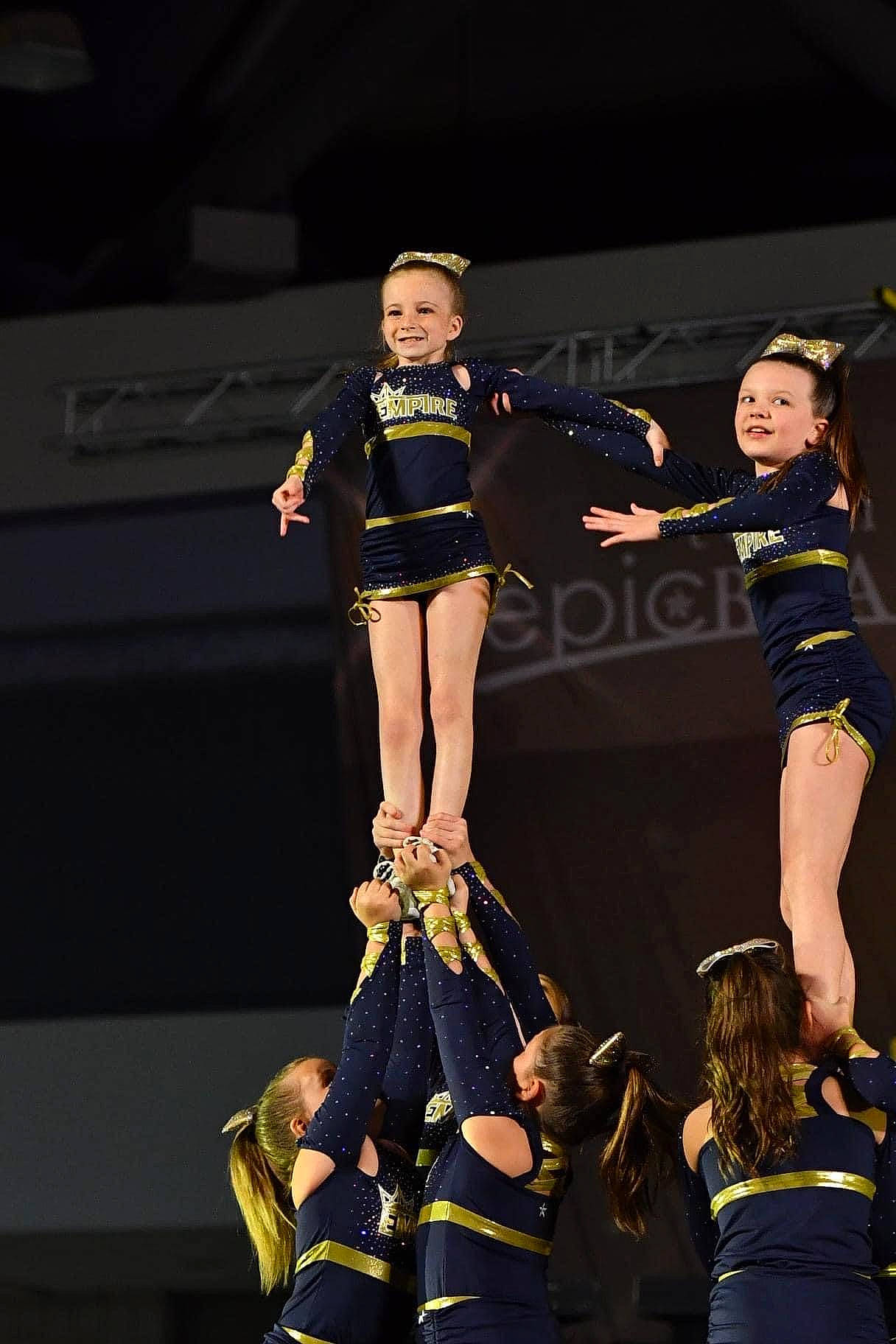 Kylie joined the competition — help win amazing prizes! artist, championship, cheerleading, cheerleading_uniform, choreography, competition, competition_event, dance, dancer, entertainment, event, fashion_design, human_leg, joy, performance_art, performing_arts, person, sports, sportswear, team_sport