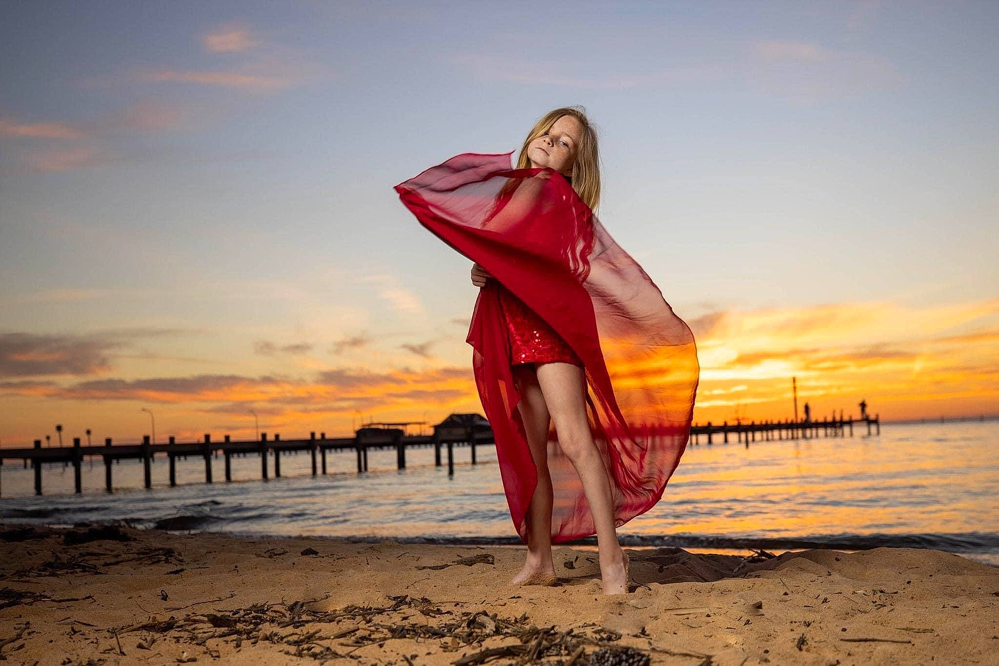 Kylie is registered to the contest to win money with this photo: beach, cloud, dusk, flash_photography, happy, horizon, lake, landscape, leisure, people_in_nature, people_on_beach, person, sand, sky, sunlight, sunrise, sunset, travel, water, wind_wave