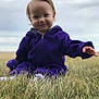 Aaliyah Ruby joined the competition — help win amazing prizes! baby, bodypart, clothing, face, field, finger, grass, grassland, hand, head, hoodie, knitwear, nature, outdoors, person, photography, plant, portrait, sweater, sweatshirt