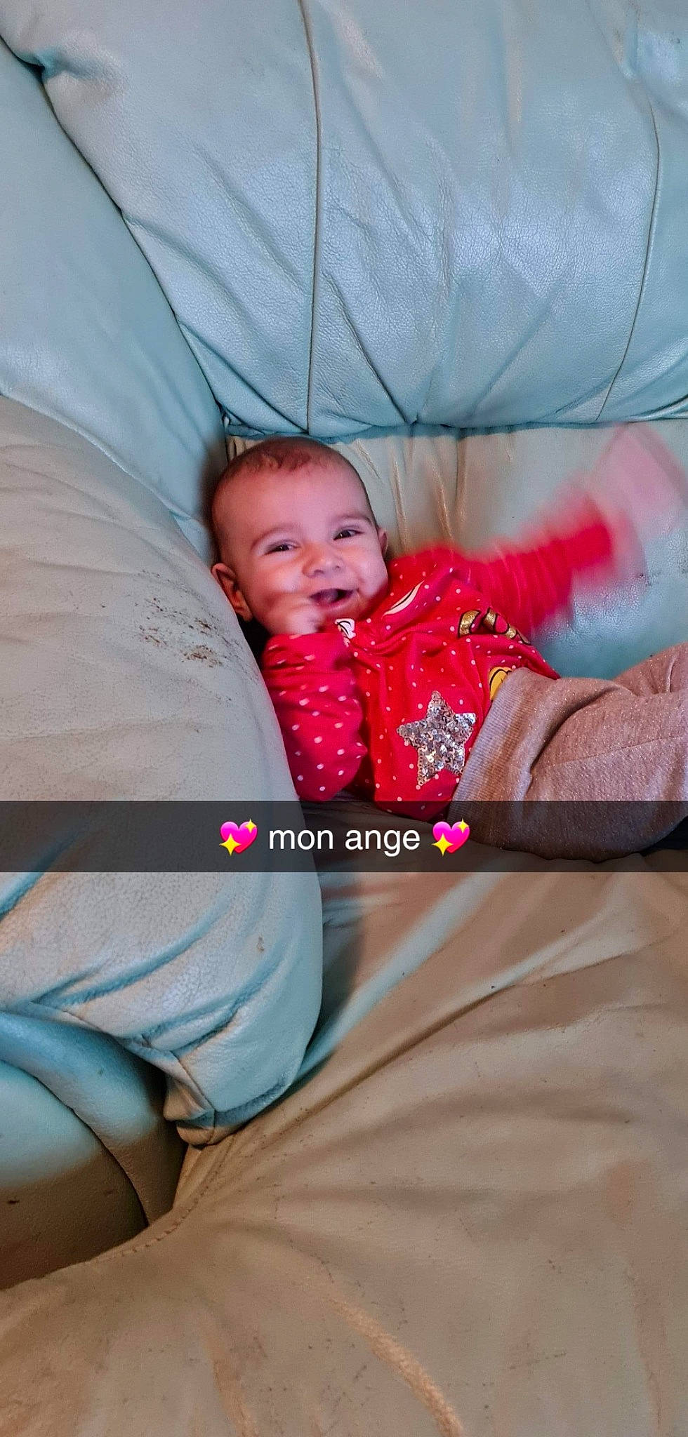 Ashley participe au concours pour gagner de l'argent avec cette photo : abdomen, baby, baby_products, child, comfort, couch, fun, happy, leisure, linens, magenta, mouth, person, product, room, sitting, sleeve, smile, textile, toddler