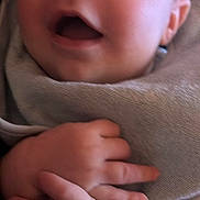 Zayden is registered to the contest to win money with this photo: baby, closeup, face, hands, blanket, infant, expression, joyful, cute, skin, young, child, portrait, soft, wrapped, newborn, candid, warm, happy, person
