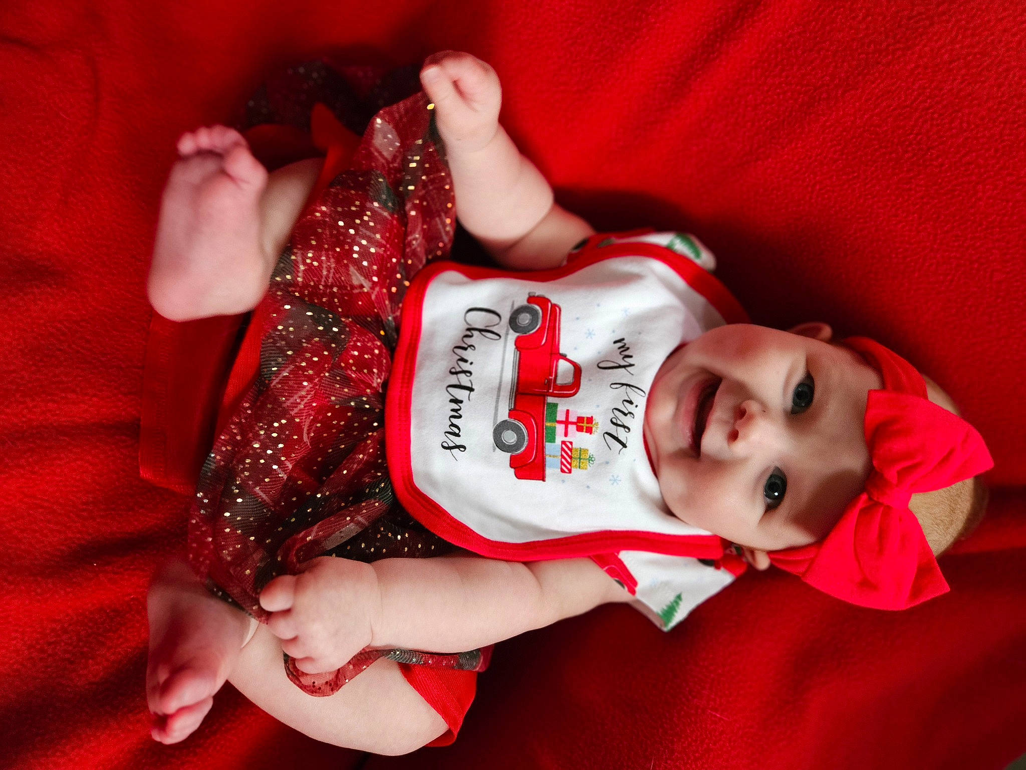 Arabella joined the competition — help win amazing prizes! baby, baby_toddler_clothing, elbow, finger, flash_photography, gesture, hand, happy, headwear, human_body, joy, lip, nail, person, red, skin, sleeve, textile, thigh, toddler