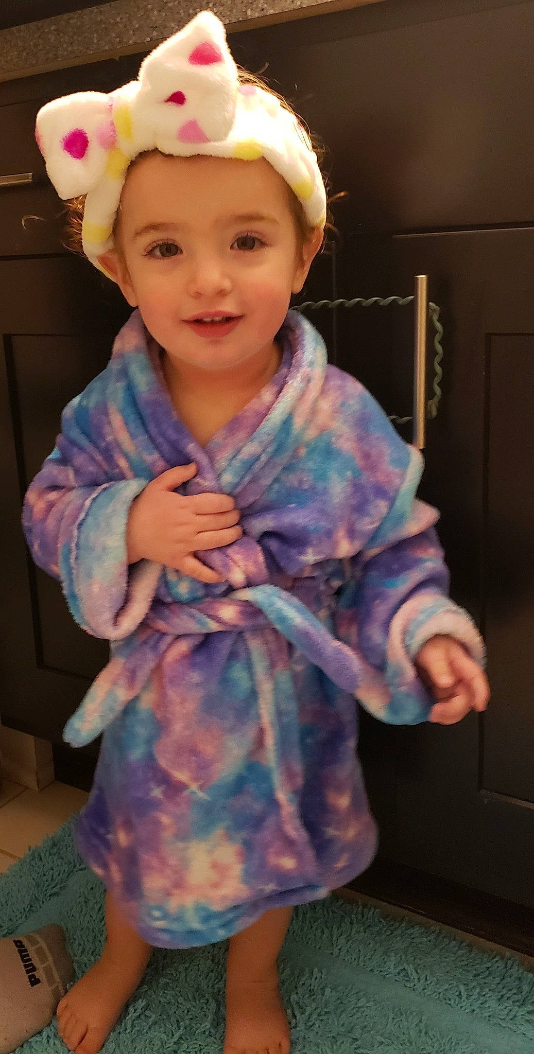 Ellie joined the competition — help win amazing prizes! baby_toddler_clothing, cap, cheek, child, clothing, electric_blue, face, fashion_accessory, hairstyle, happy, headband, headgear, headpiece, headwear, joy, pattern, person, pink, purple, sleeve