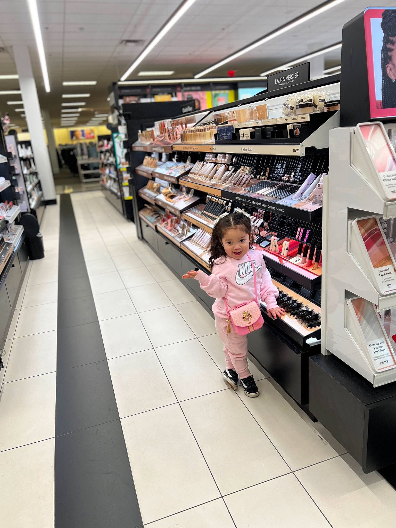 Emery is registered to the contest to win money with this photo: aisle, bag, convenience_store, customer, event, fashion, floor, flooring, grocery_store, joy, marketplace, person, product, publication, retail, room, service, shelf, shelving, shopping