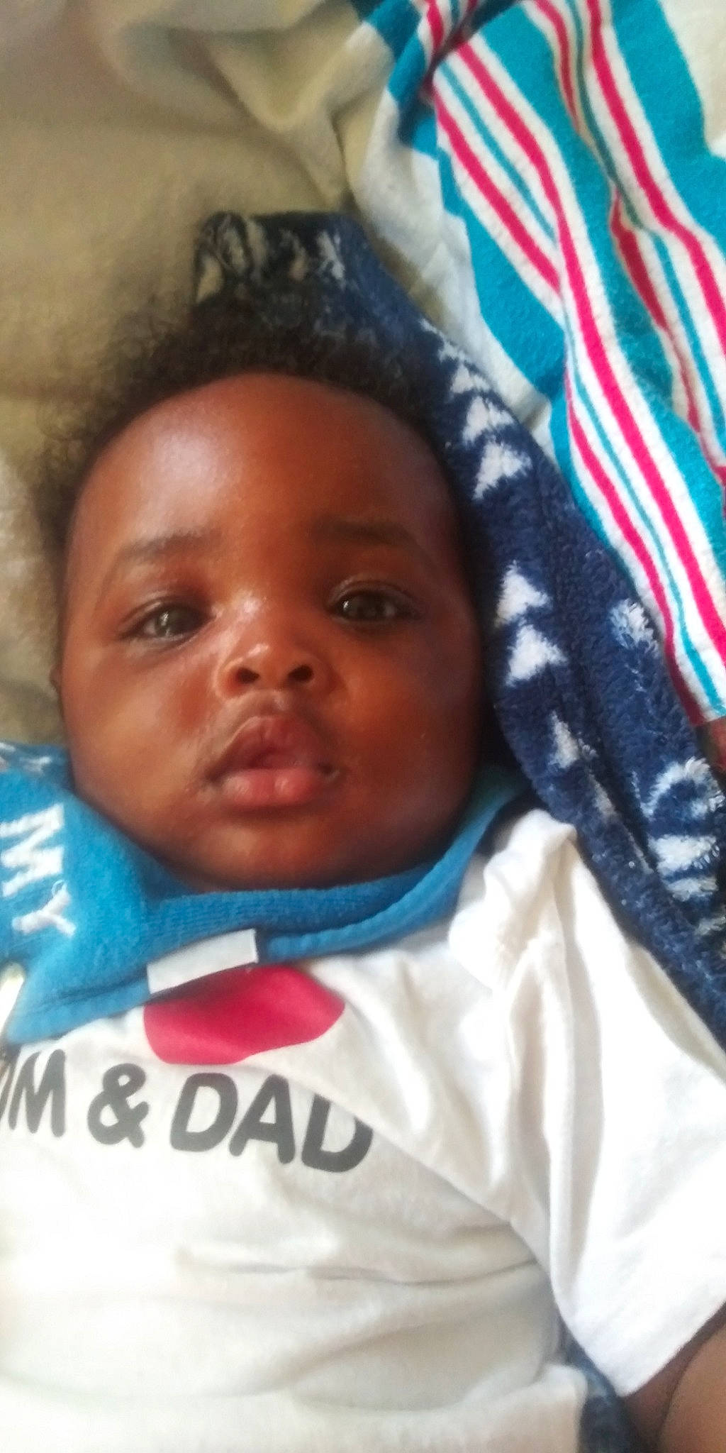 André is registered to the contest to win money with this photo: baby, black_hair, cheek, child, cool, eye, eyebrow, face, forehead, head, lip, nose, person, skin, smile, toddler