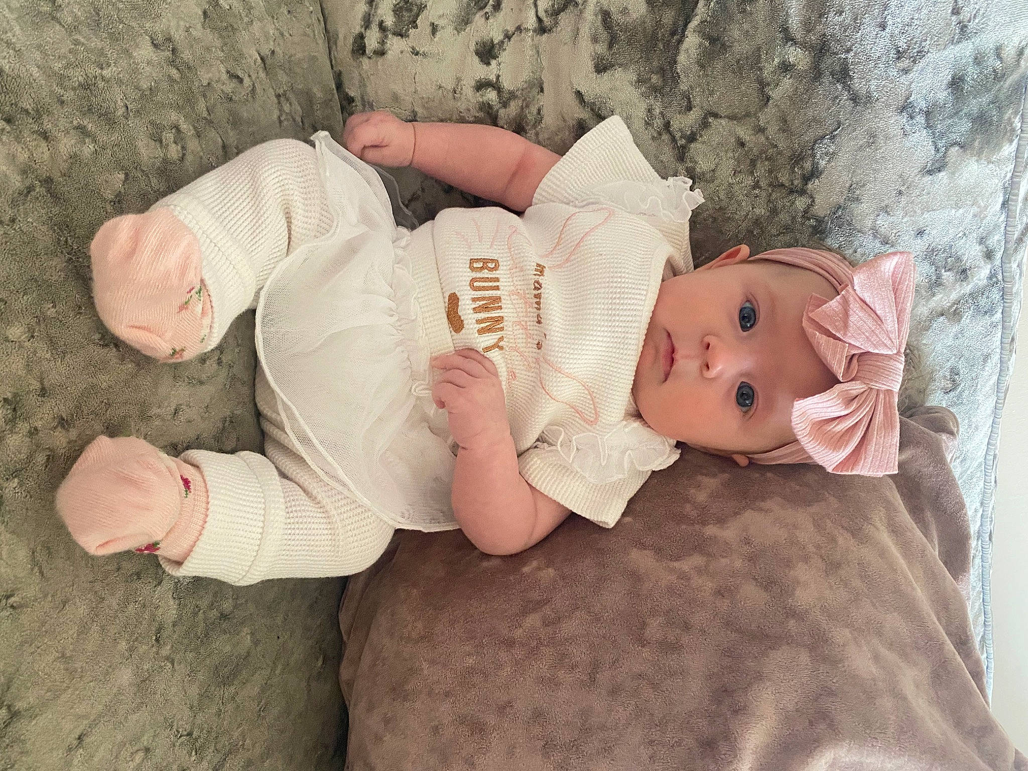 Autumn is registered to the contest to win money with this photo: arm, baby, baby_toddler_clothing, child, comfort, dress, eye, finger, glasses, hand, hat, head, headgear, headwear, human_body, leg, person, skin, sleeve, toddler