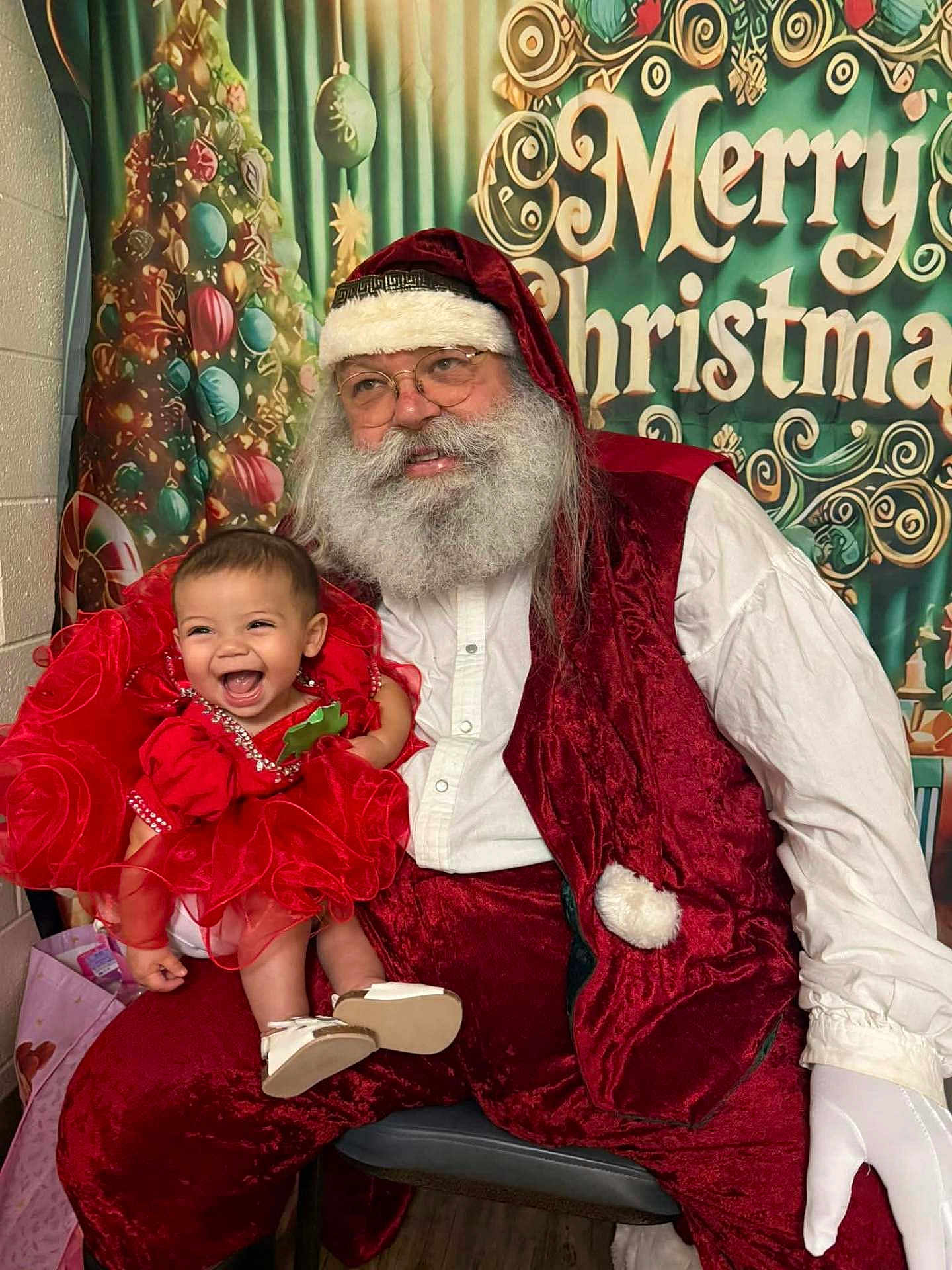 Nova joined the competition — help win amazing prizes! baby, beard, celebration, chair, child, christmas, costume, decoration, festive, glasses, gloves, happy, holiday, indoor, laughing, portrait, red_dress, santa_claus, smile, white_shirt