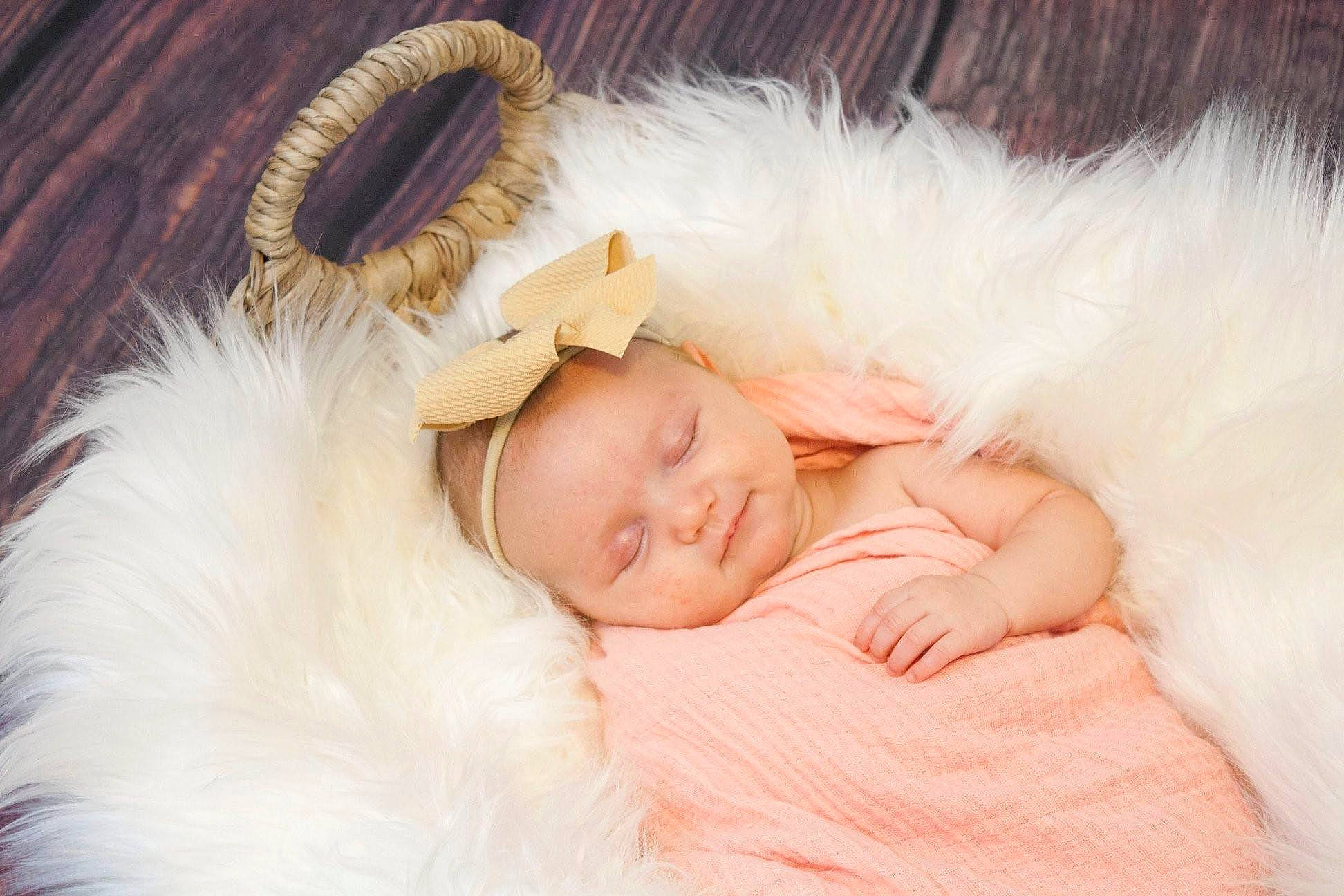 Leanna is registered to the contest to win money with this photo: baby, baby_sleeping, child, ear, fur, hair_accessory, headgear, nap, person, photography, skin, sleep, toddler