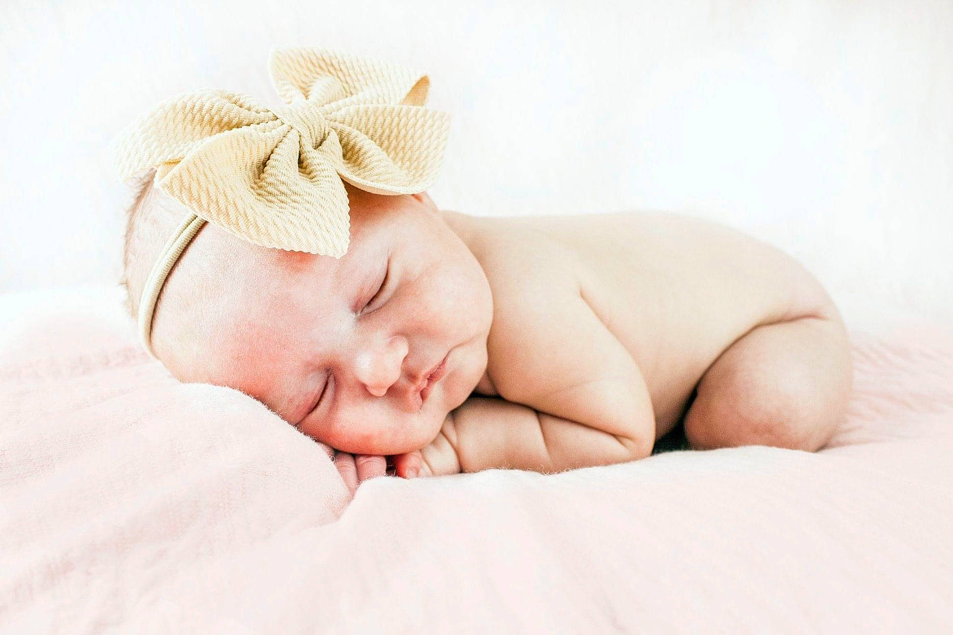 Leanna is registered to the contest to win money with this photo: baby, baby_sleeping, beanie, beige, child, comfort, fashion_accessory, hair_accessory, headband, headgear, headpiece, person, photograph, photography, portrait_photography, skin, sleep, toddler