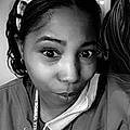 Tasha C.