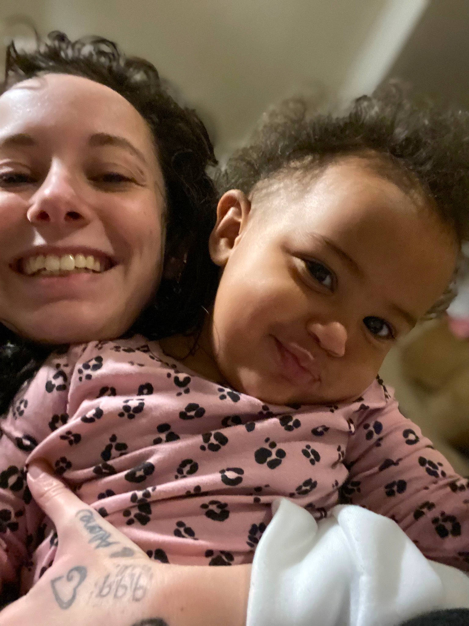 Fallon Hope is registered to the contest to win money with this photo: cheek, child, comfort, event, fun, fur, gesture, happy, hug, iris, joy, laugh, love, mouth, nose, pattern, person, selfie, sitting, skin