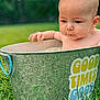 baby, bucket, metal, outdoor, grass, nature, child, curious, expression, summer, green, playful, infant, skin, head, hand, sitting, young, portrait, daylight