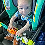 baby, child, car_seat, toy, blue_eyes, sandals, clothing, seatbelt, infant, closeup, person, cute, indoors, playful, child_safety, car, seat, portrait, hands, young