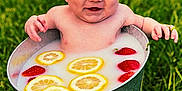 Kingston joined the competition — help win amazing prizes! baby, milk_bath, bucket, lemon_slices, strawberries, grass, outdoor, child, smiling, fruit, playful, nature, summer, cute, water, skin, fresh, happy, sitting, fun