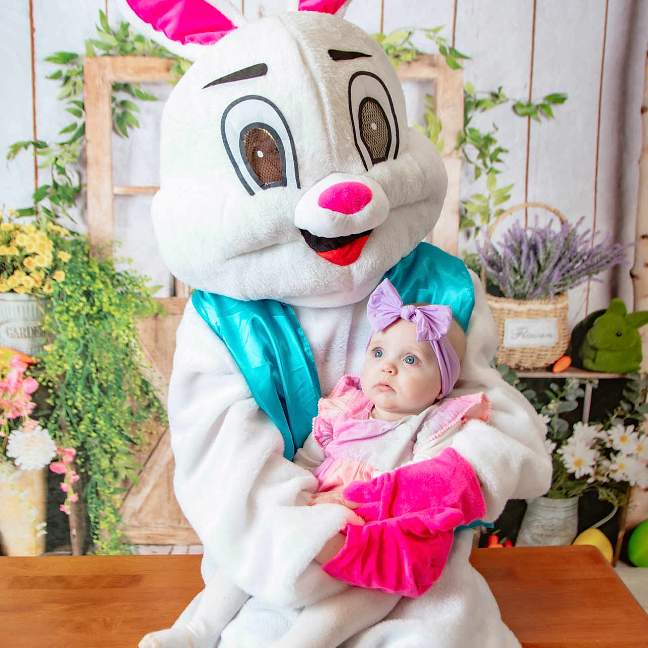 Scarlett is registered to the contest to win money with this photo: baby, clothing, costume, face, flower, flowerarrangement, flowerbouquet, glove, hardwood, hat, head, mascot, people, person, photography, plant, portrait, pottedplant, toy, wood