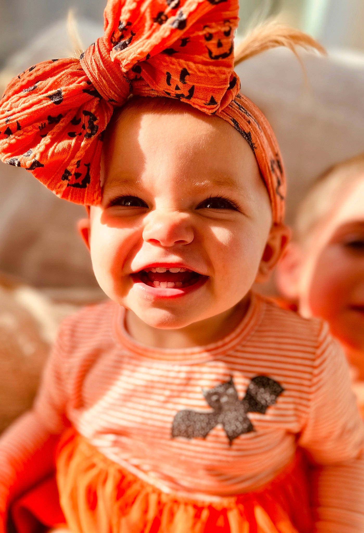 Maisie joined the competition — help win amazing prizes! baby_toddler_clothing, beauty, child, costume_hat, event, eye, face, facial_expression, fun, happy, headpiece, orange, organ, person, pink, red, skin, sleeve, smile, toddler