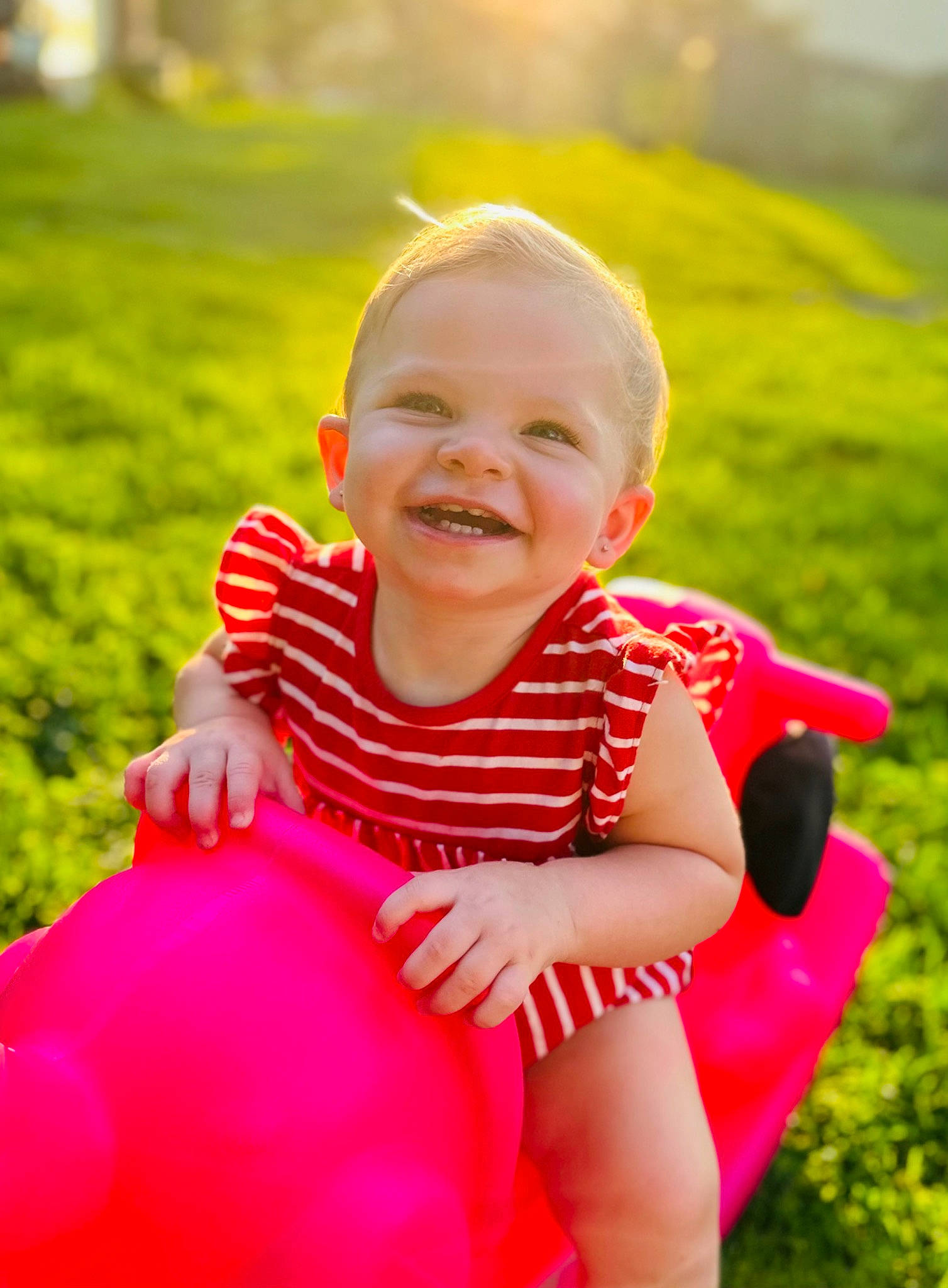 Maisie joined the competition — help win amazing prizes! arm, baby, baby_laughing, baby_toddler_clothing, dress, eye, finger, fun, gesture, grass, happy, joy, leisure, lip, people_in_nature, person, pink, plant, playing_with_kids, skin