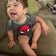 Cruz joined the competition — help win amazing prizes! toddler, child, smiling, laughing, couch, indoor, clothing, onesie, spiderman, happy, person, baby, seat, furniture, cute, skin, head, hair, hand, foot
