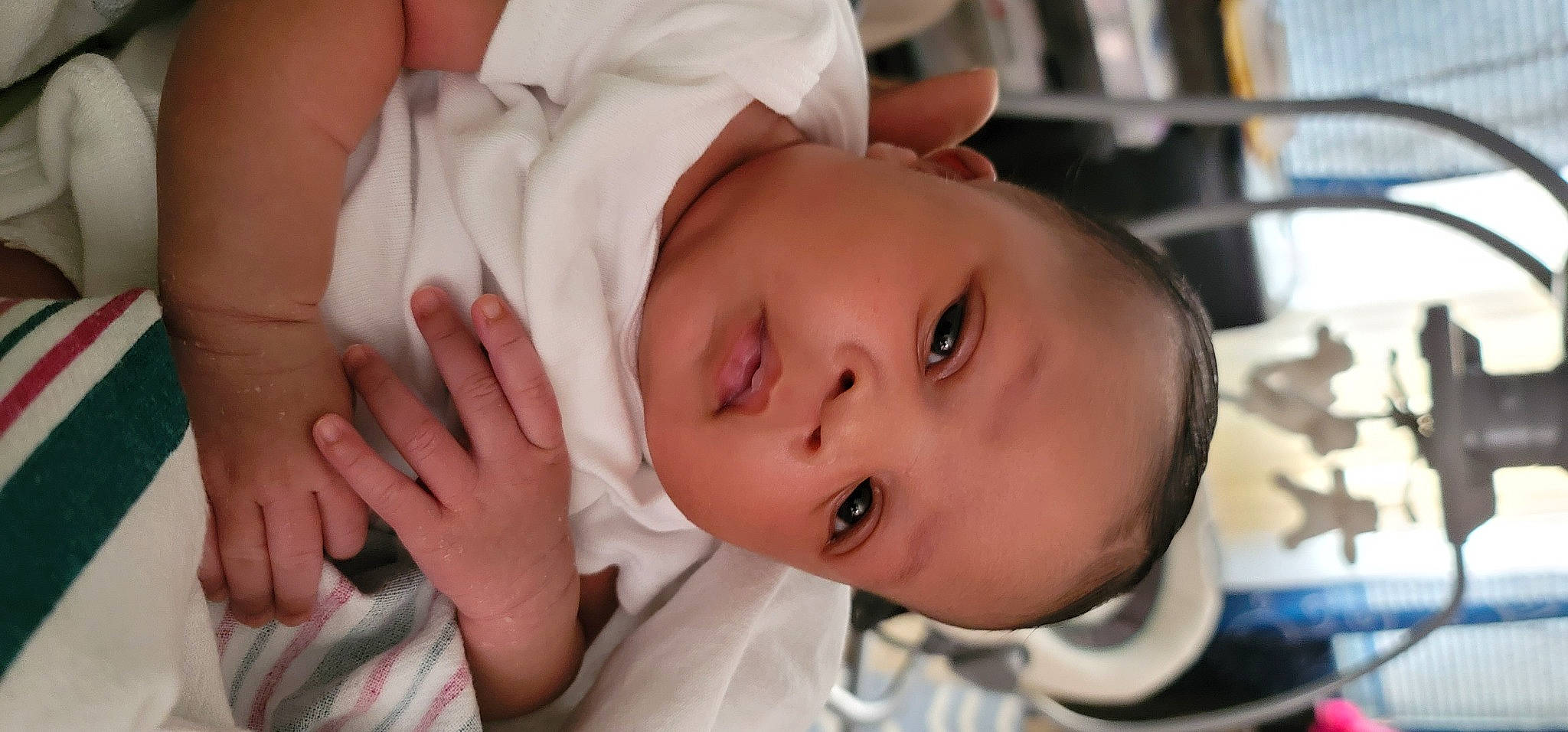 Mi'Liyah is registered to the contest to win money with this photo: baby, baby_toddler_clothing, cheek, chin, comfort, eye, eyebrow, eyelash, face, finger, gesture, happy, hat, head, human_body, lip, mouth, nose, person, skin