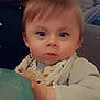 Logan a rejoint le concours — aidez-le/la à gagner de superbes lots ! baby, baby_toddler_clothing, cheek, child, dress, drinkware, event, fun, hair, happy, iris, nose, party_supply, sitting, skin, toddler, tree, vacation, vehicle_door, window