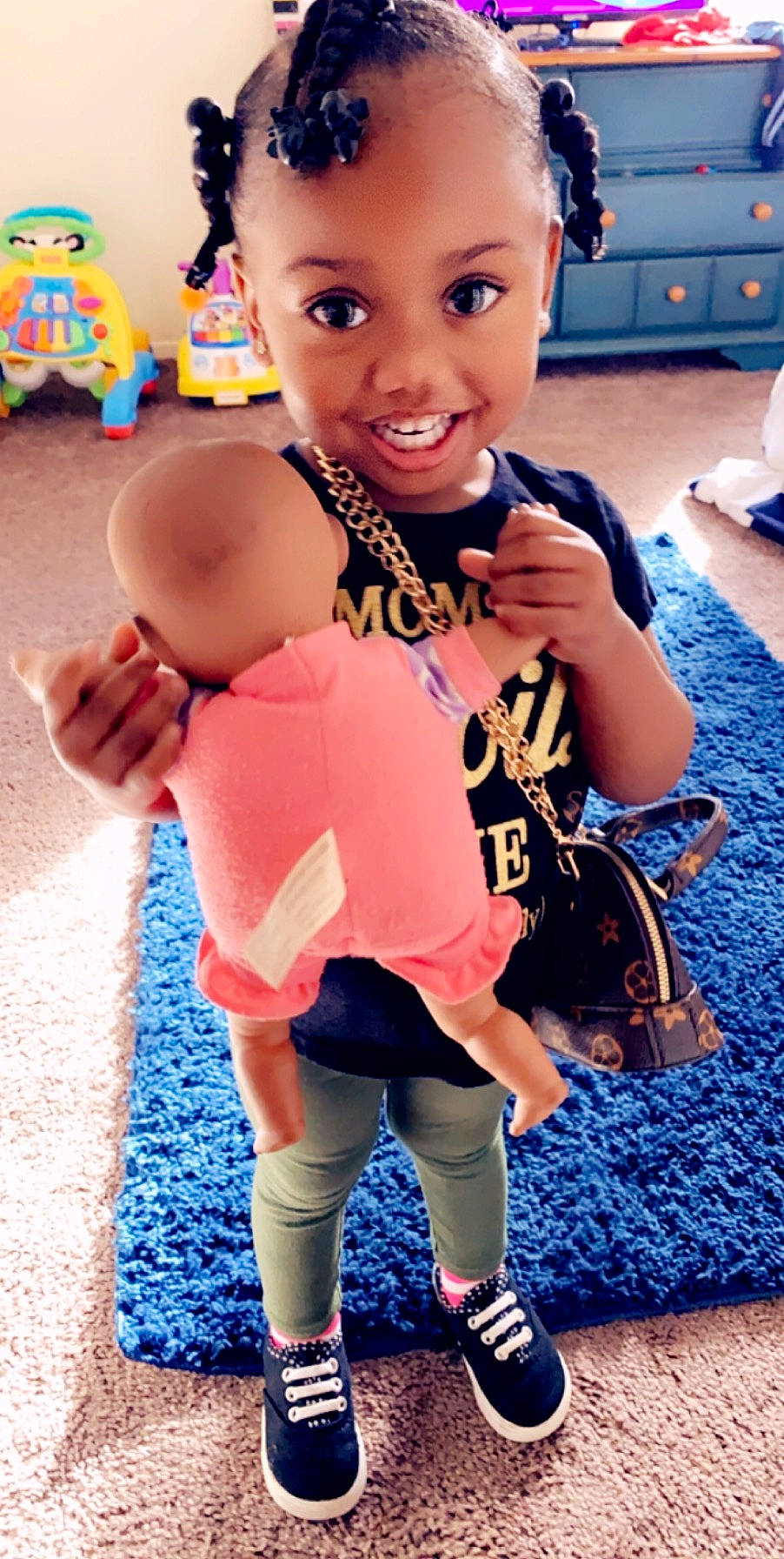 Rayleigh is registered to the contest to win money with this photo: baby, baby_toddler_clothing, cheek, child, cool, footwear, joy, person, play, shoe, sleeve, smile, toddler, toy