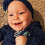 Brytyn joined the competition — help win amazing prizes! adorable, baby, baby_clothes, blue_clothing, carpet, cheerful, child, closeup, cute, face, happy, headband, indoor, infant, lying_down, portrait, small_hand, smiling, striped_shirt, young_child