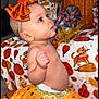 autumn, baby, blanket, bow, child, cute, decor, dog, face, fall, headband, holiday, indoor, orange, pattern, plush, portrait, pumpkin, skirt, toddler