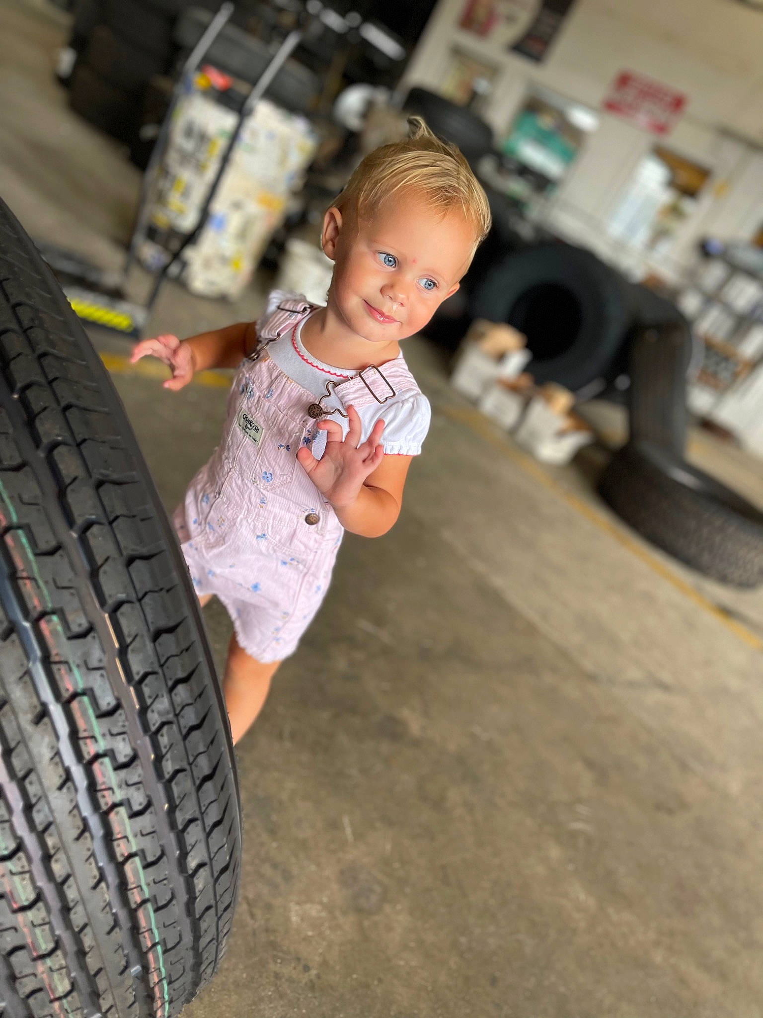 Delilah joined the competition — help win amazing prizes! automotive_design, automotive_tire, flash_photography, flooring, fun, hand, happy, hubcap, joy, leisure, motor_vehicle, person, rim, rolling, synthetic_rubber, t_shirt, tire, tire_care, toddler, tread