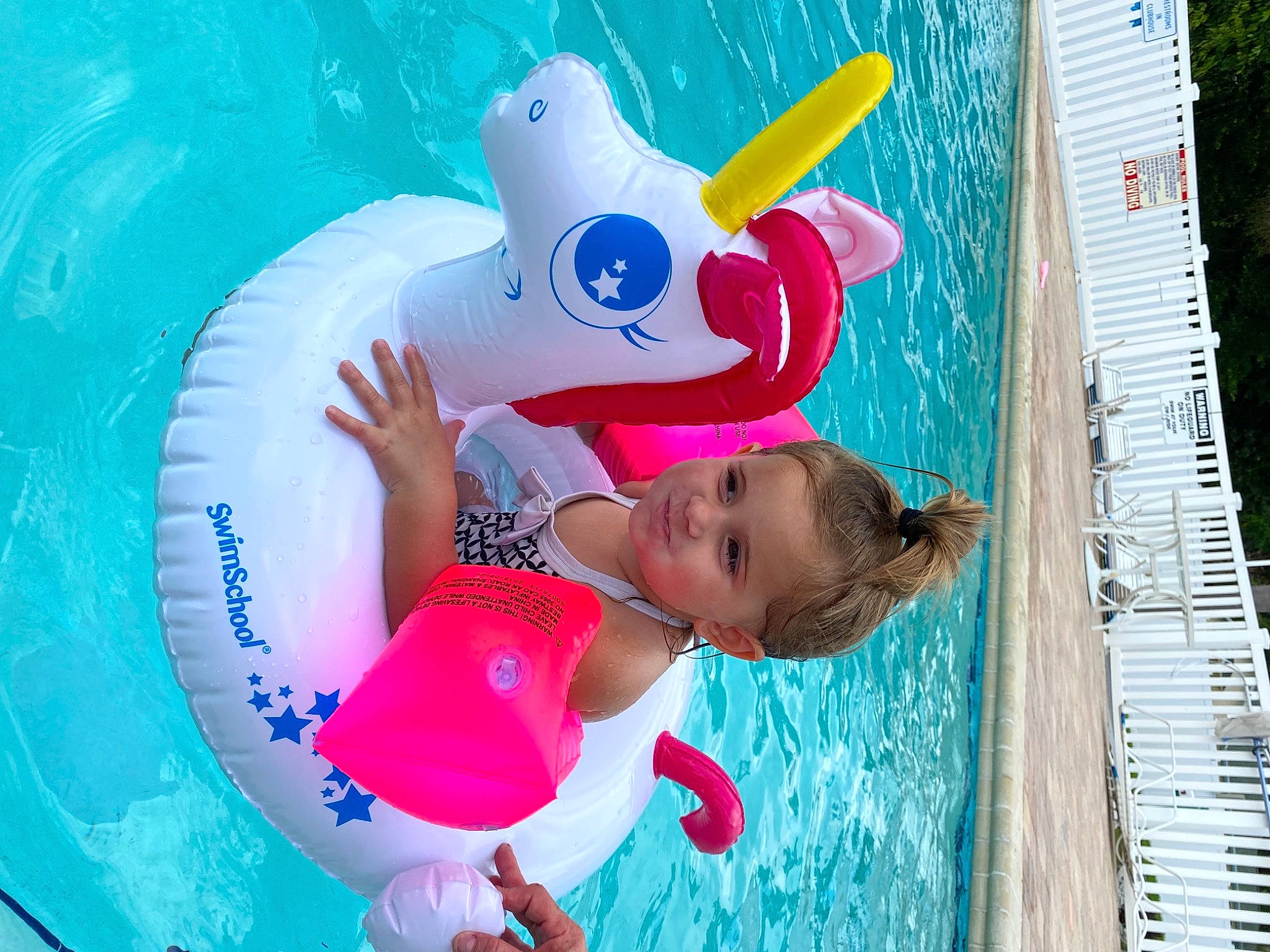 Paizley is registered to the contest to win money with this photo: aqua, azure, baby_products, baby_toddler_clothing, bathing, child, fun, games, happy, inflatable, leisure, magenta, nonbuilding_structure, party_supply, person, pink, play, recreation, toddler, toy