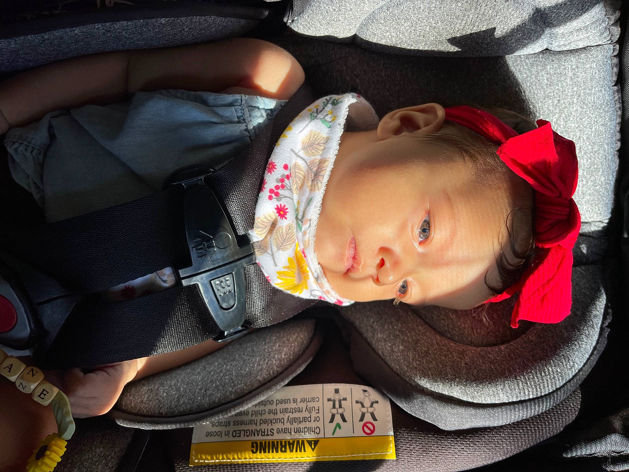 Sloane joined the competition — help win amazing prizes! auto_part, baby, baby_carriage, baby_in_car_seat, baby_products, baby_safety, baby_toddler_clothing, bag, car_seat, carmine, child, comfort, fashion_accessory, hat, head, headgear, person, seat_belt, sitting, steering_wheel