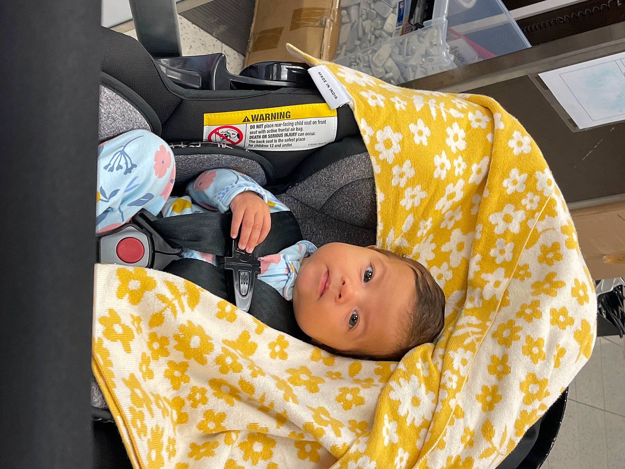 Sloane is registered to the contest to win money with this photo: auto_part, baby, baby_carriage, baby_products, baby_safety, baby_toddler_clothing, car_seat, child, comfort, event, infant_bed, lap, motor_vehicle, nap, person, room, sitting, sleep, toddler