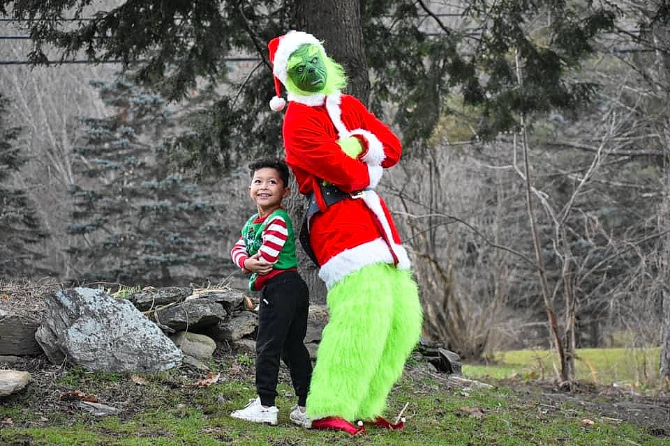 Sebastian joined the competition — help win amazing prizes! boot, child, event, fictional_character, forest, fur, glove, grass, happy, hat, holiday, joy, people_in_nature, person, plant, recreation, running, santa_claus, sports, tree