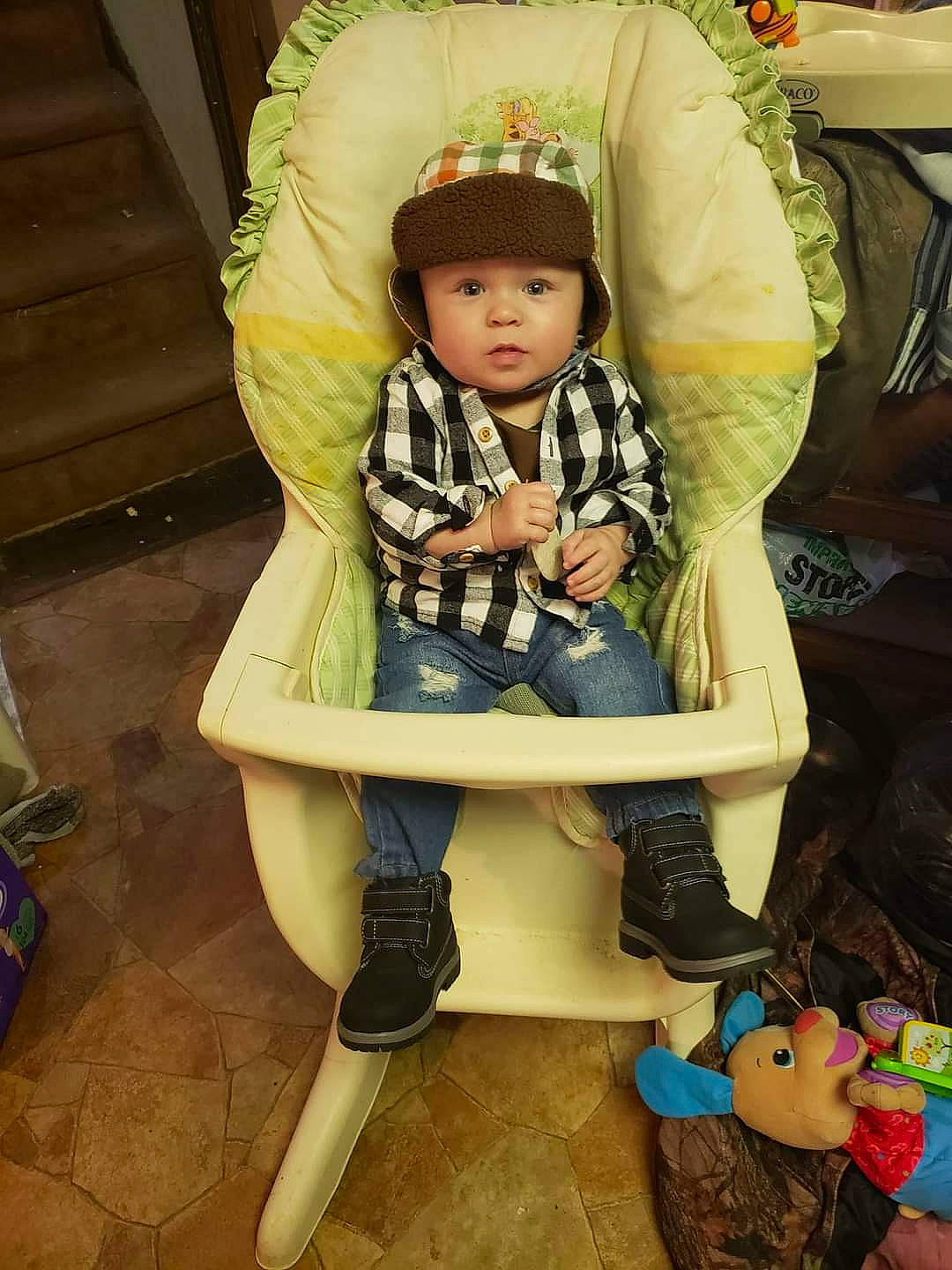Ethan Jr is registered to the contest to win money with this photo: baby, baby_carriage, baby_products, baby_safety, baby_toddler_clothing, boot, cap, chair, child, comfort, fashion_accessory, fun, headwear, lap, person, personal_protective_equipment, shoe, sitting, sneakers, sock