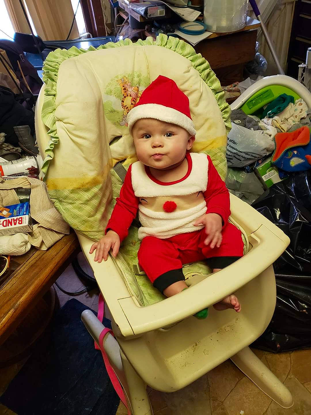 Ethan Jr joined the competition — help win amazing prizes! automotive_tire, baby, baby_toddler_clothing, bag, beanie, cap, child, fictional_character, fun, hat, headgear, headwear, helmet, holiday, knit_cap, person, personal_protective_equipment, shelf, sitting, tire